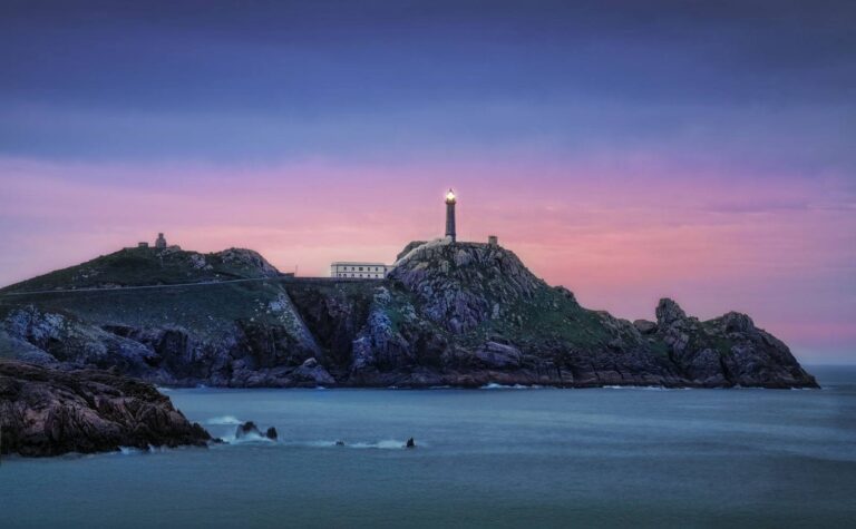 114. Cabo e faro Vilán ao solpor